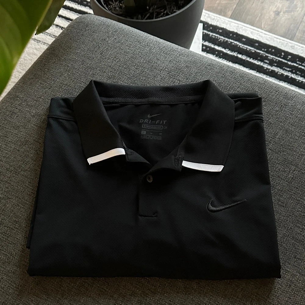 Nike Men's Black Polo Shirt with White Accents - Picture 1 of 7